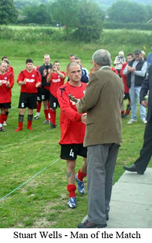 Stuart Wells receives Man-of-the-Match award in Weald of Kent Charity Cup Final