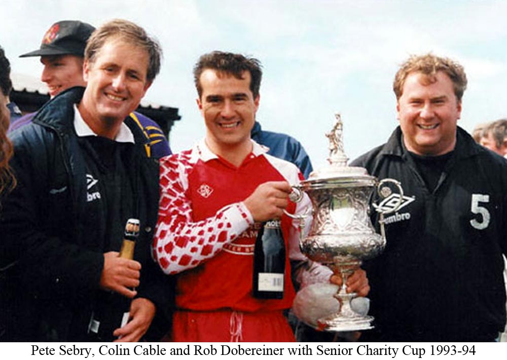Platt's Peter Sebry, Colin Cable and Manager Rob Dobereiner with the Sevenoaks Charity Senior Cup in 1994