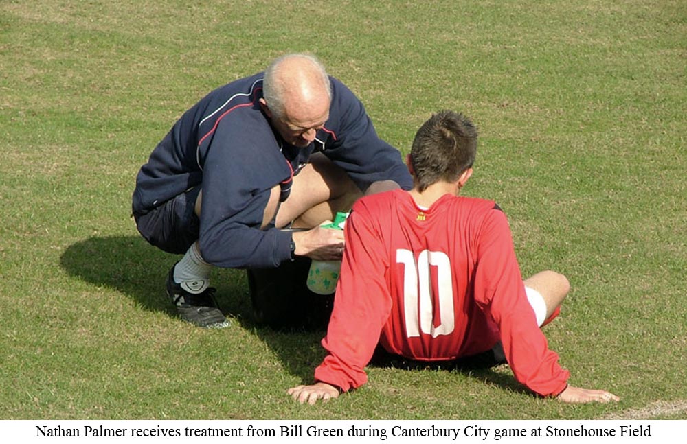 Platt striker Natahan Palmer receives treatment during Kent County League action against Canterbury City in 2007