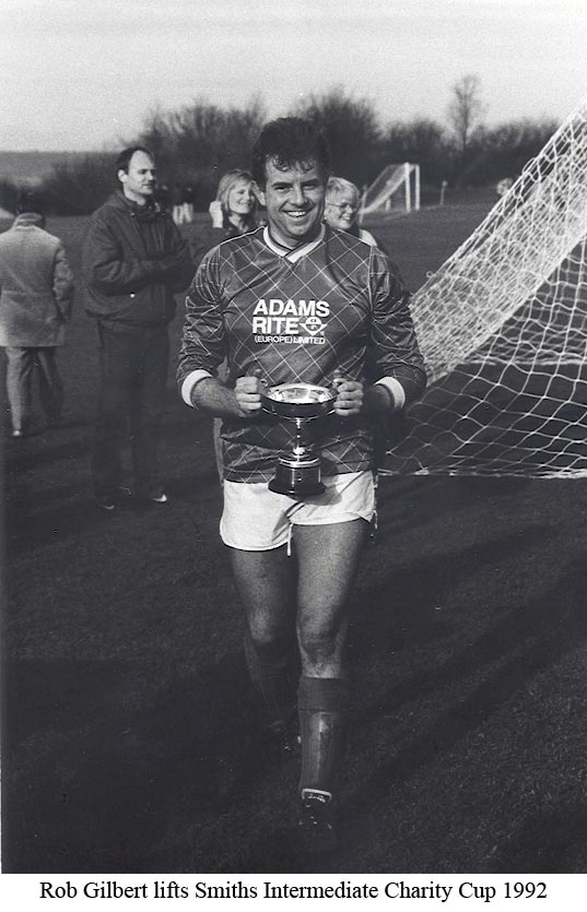 Platt Reserves Captain Rob Gilbert lifts the Smiths Intermediate Charity Cup against arch rivals Borough Green Rangers in 1992