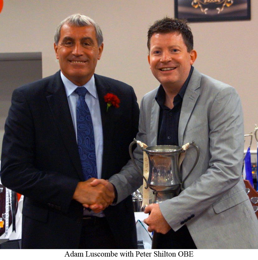 Platt's goalkeeper Adam Luscombe receives trophy from Peter Shilton OBE in 2014