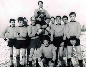 Photo showing Platt captain John Hopkins aloft with the Smiths Junior Cup in 1964-65